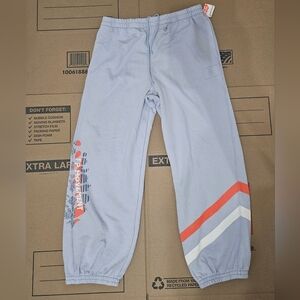 FP Movement by Free People Light Blue Joggers with Orange and White Accents